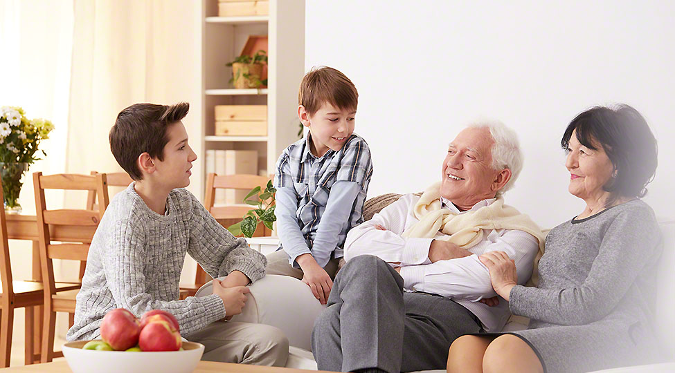 Boys talking with grandparents