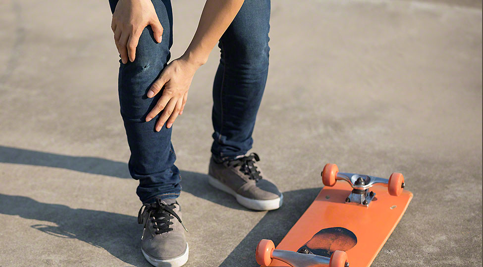 skateboarder got spirts injury skateboarding on skatepark