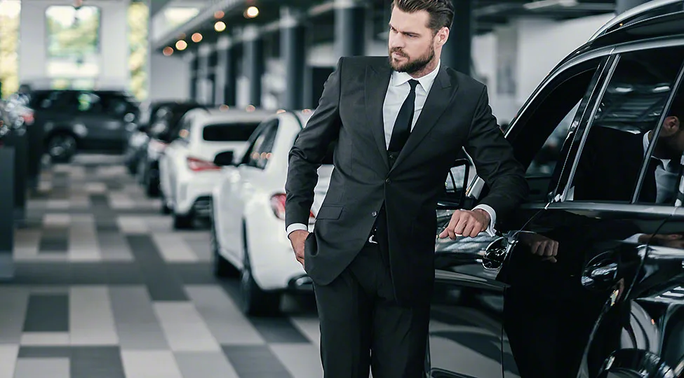 Top sales manager at dealership showroom